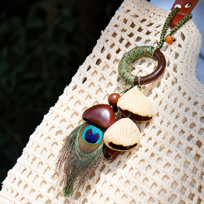 Handmade Boho Seed Pod Bag Charm | Natural Nut Shell Purse Accessory & Car Hanging Ornament with Peacock Feather
